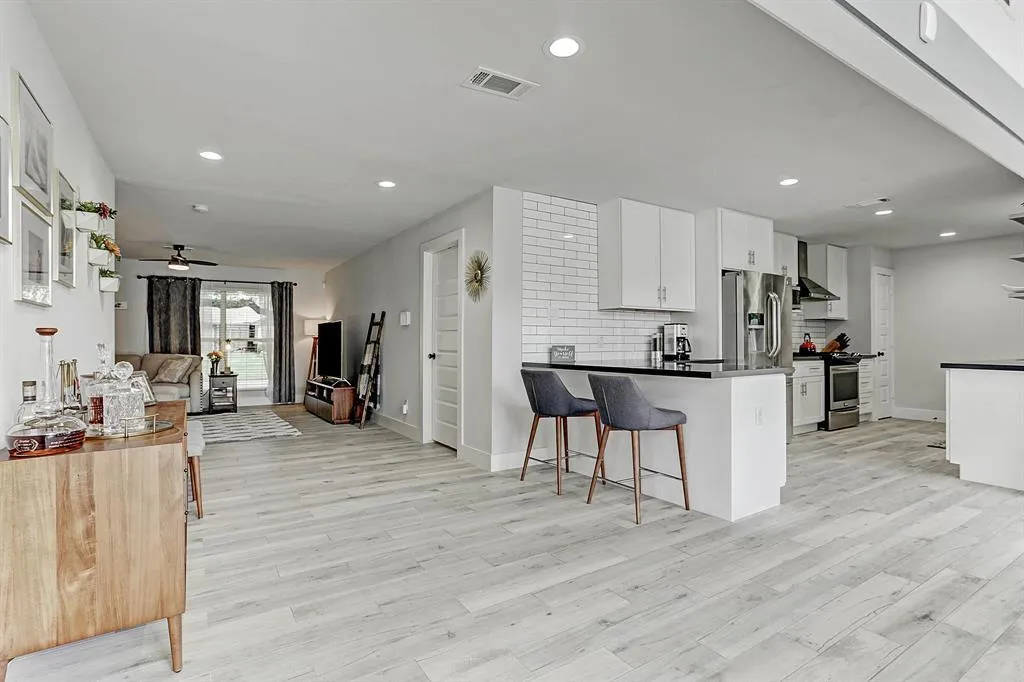 Bright, freshly cleaned open-plan kitchen and living area